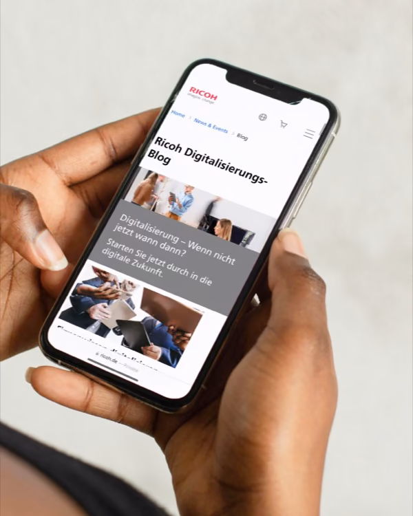 The Ricoh blog open on a phone.